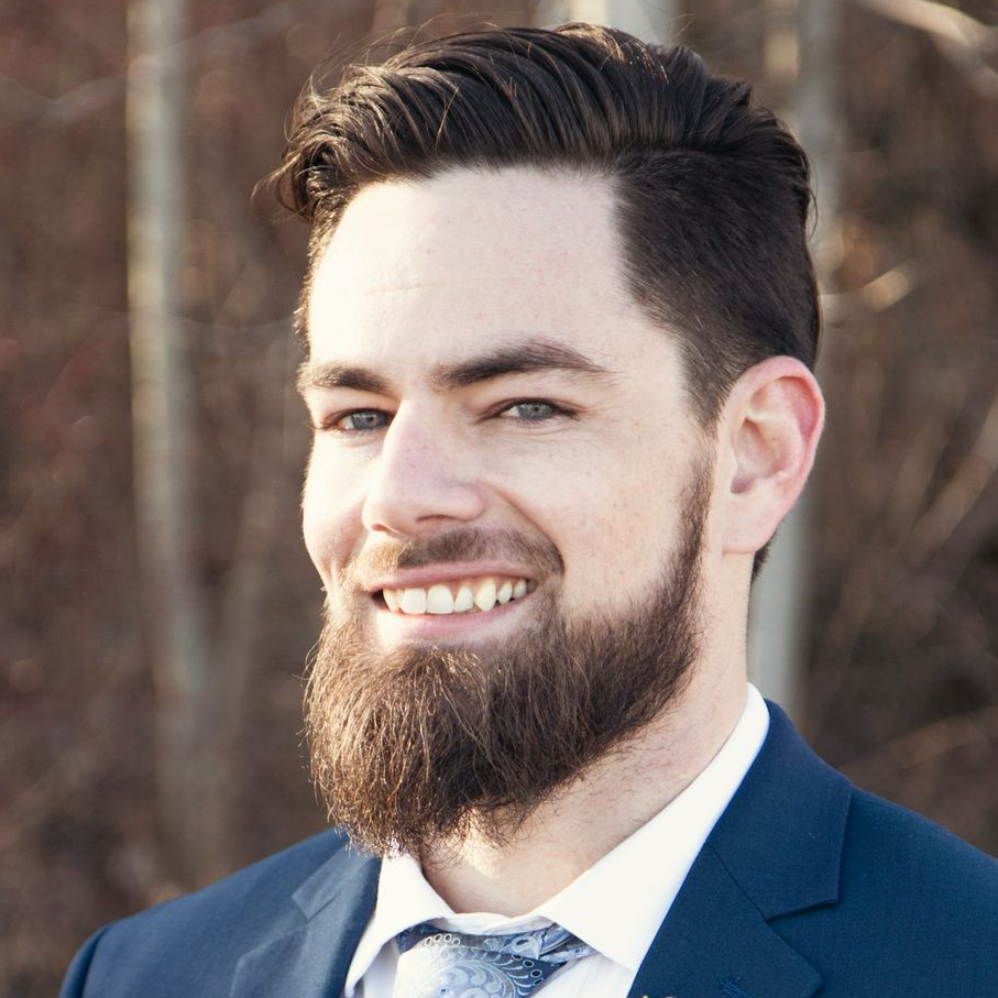 smiling man wearing suit